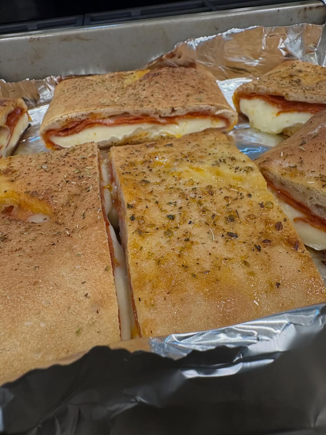 Cut pepperoni stromboli